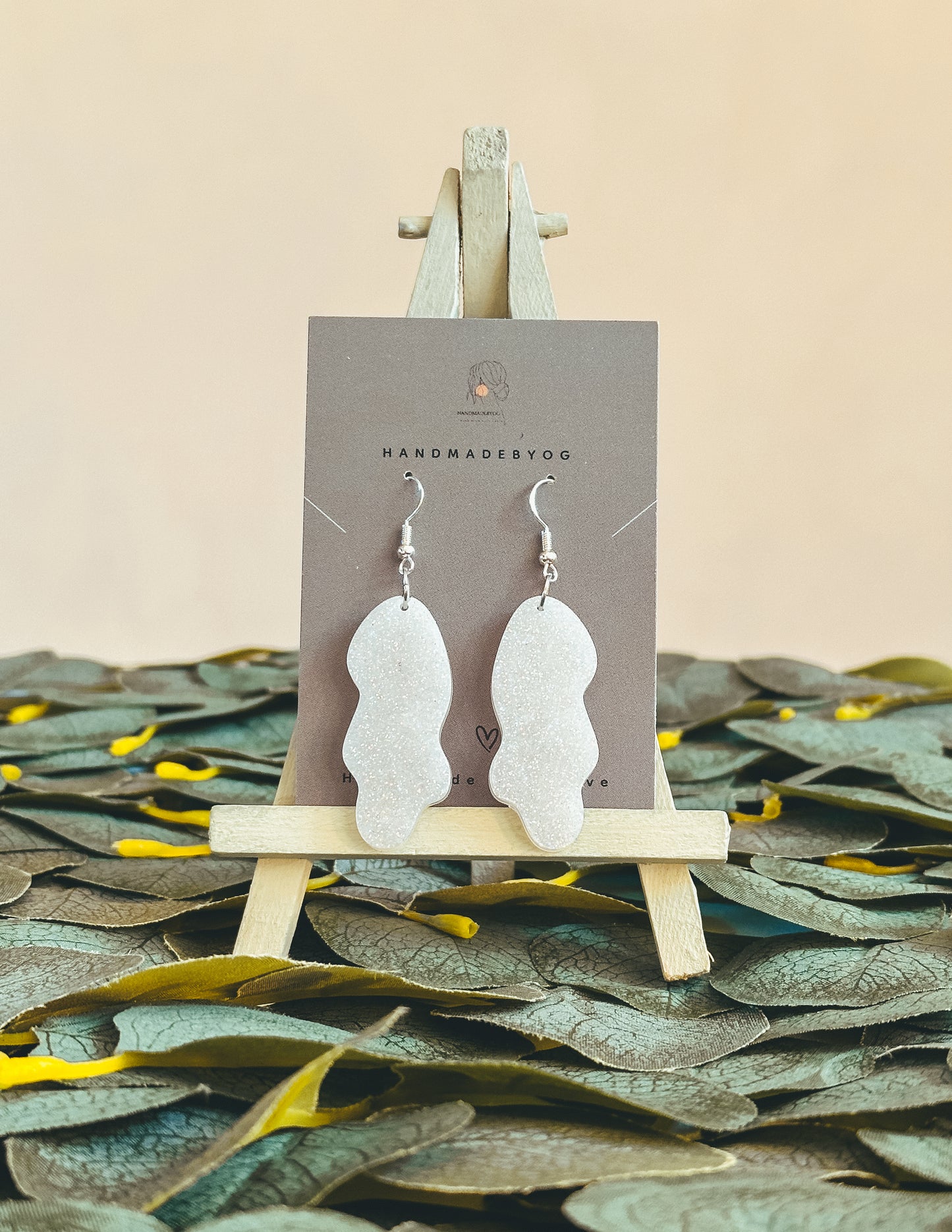 The White Glitter Squiggle Earrings