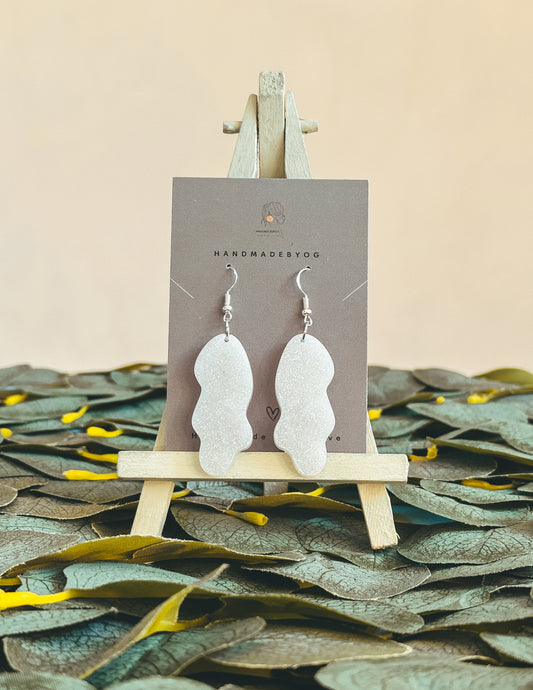 The White Glitter Squiggle Earrings